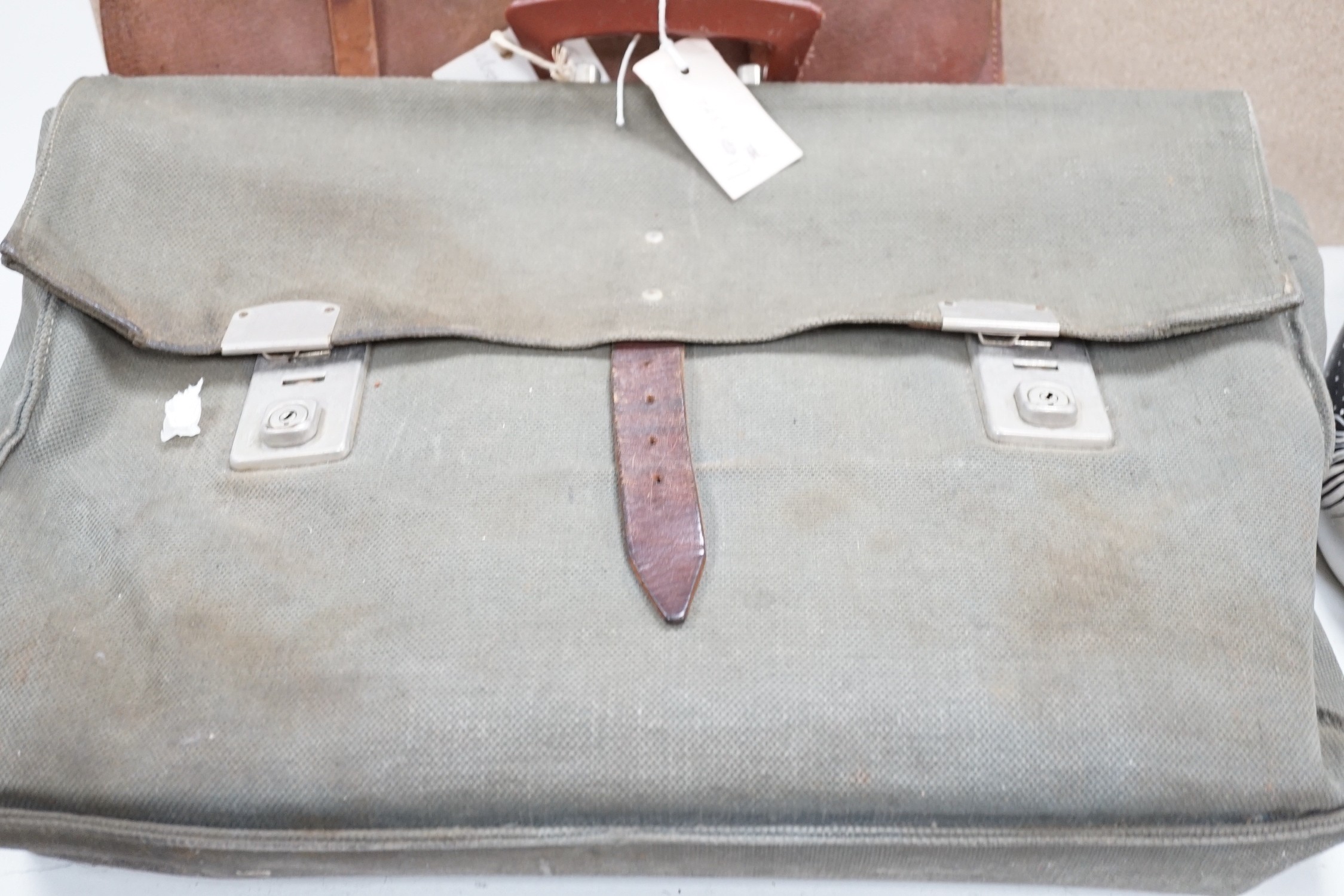 A satchel with George the VI monogram, a German Third Reich style satchel, a quantity of wartime maps and another satchel